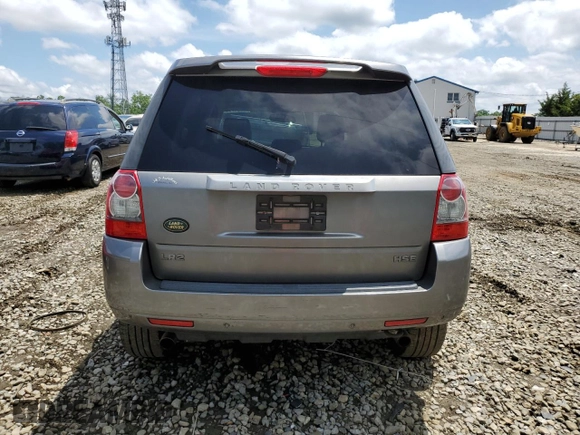 2010 Land Rover LR2 HSE with VIN SALFR2BN5AH191866, listed as a Copart auction lot 60617335 with 154,409 mi miles and Salvage title. Bid and sale history available at DreamBid. Image 6.