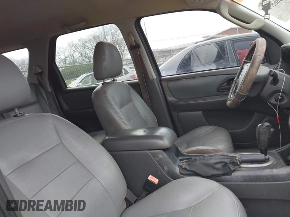 2005 Ford Escape XLT with VIN 1FMYU03155KB15647, listed as a IAAI auction lot 41865555 with 1 mi miles. Bid and sale history available at carsss.com. Image 5.
