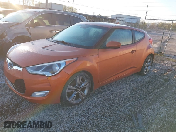 2012 Hyundai Veloster w/Black Int with VIN KMHTC6AD5CU044657, listed as a IAAI auction lot 41896892 with 115,846 mi miles and . Bid and sale history available at DreamBid. Image 2.