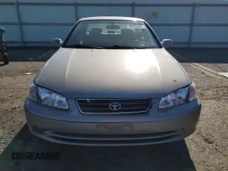 2000 Toyota Camry CE z VIN 4T1BG22K0YU692937, wystawiony jako Copart lot #57456985 z przebiegiem 116 617 mil mil oraz Szkoda całkowita • Salvage title. Historia ofert i sprzedaży dostępna na DreamBid. Obrazek 5.