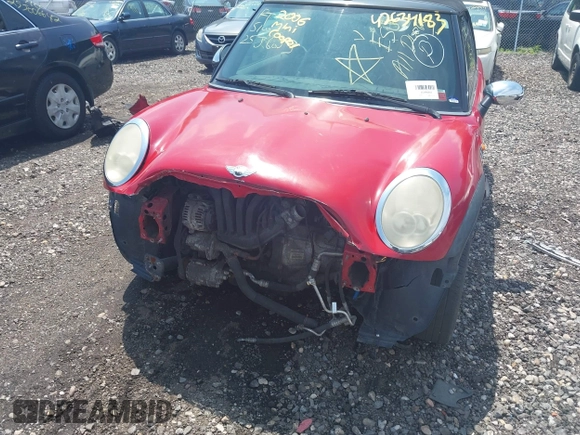 2006 MINI Convertible z VIN WMWRF33546TG13986, wystawiony jako IAAI lot #42634138 z przebiegiem Nie podano mil oraz . Historia ofert i sprzedaży dostępna na DreamBid. Obrazek 6.