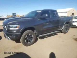 2019 Ram 1500 Rebel z VIN 1C6SRFET7KN865176, wystawiony jako Copart lot #50752515 z przebiegiem 60 963 mil mil oraz Szkoda całkowita • Salvage title. Historia ofert i sprzedaży dostępna na DreamBid. Obrazek 1.