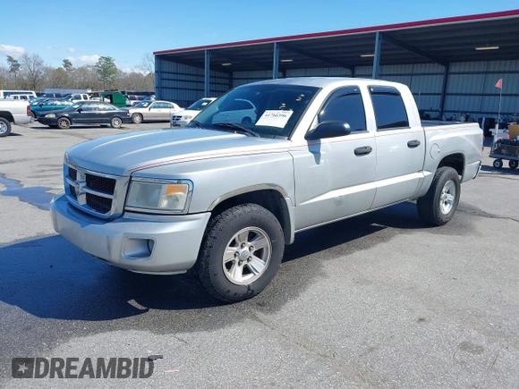 2008 Dodge Dakota SLT with VIN 1D7HE48K78S514290, listed as a IAAI auction lot 41766396 with 208,744 mi miles and . Bid and sale history available at carsss.com. Image 2.