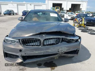2018 BMW 4 Series 440i with VIN WBA4J5C54JBF07315, listed as a IAAI auction lot 41738540 with 74,577 mi miles and . Bid and sale history available at DreamBid. Image 12.