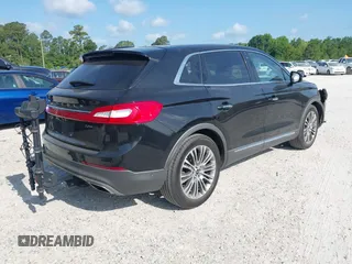 2016 Lincoln MKX Reserve with VIN 2LMTJ6LP9GBL27835, listed as a IAAI auction lot 42175905 with 87,541 mi miles. Bid and sale history available at carsss.com. Image 4.