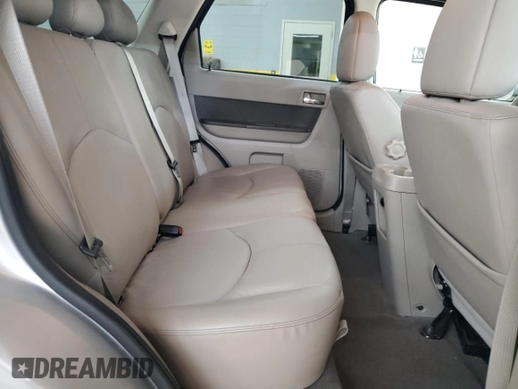 2009 Mercury Mariner Premier z VIN 4M2CU87GX9KJ17731, wystawiony jako Copart lot #54204855 z przebiegiem 54 521 mil mil oraz Szkody całkowita. Historia ofert i sprzedaży dostępna na DreamBid. Obrazek 11.