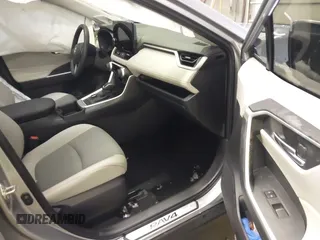 2024 Toyota RAV4 Hybrid XLE Premium with VIN JTMB6RFV5RD148973, listed as a IAAI auction lot 41516422 with 8,797 mi miles. Bid and sale history available at carsss.com. Image 5.