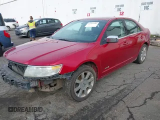 2008 Lincoln MKZ with VIN 3LNHM28T98R645089, listed as a IAAI auction lot 41601946 with 128,480 mi miles. Bid and sale history available at carsss.com. Image 2.