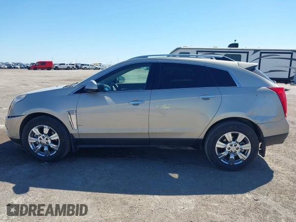 2015 Cadillac SRX Luxury Collection z VIN 3GYFNBE38FS641807, wystawiony jako IAAI lot #41669512 z przebiegiem 147 889 mil mil oraz . Historia ofert i sprzedaży dostępna na DreamBid. Obrazek 14.