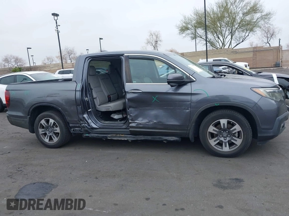 2017 Honda Ridgeline RTL-T with VIN 5FPYK2F67HB002854, listed as a IAAI auction lot 41895895 with 86,882 mi miles and . Bid and sale history available at DreamBid. Image 14.