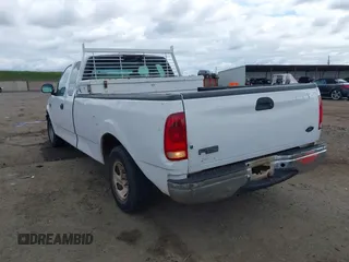2000 Ford F-150 XL with VIN 1FTRX17W5YKB03384, listed as a IAAI auction lot 41723526 with 281,658 mi miles. Bid and sale history available at carsss.com. Image 3.