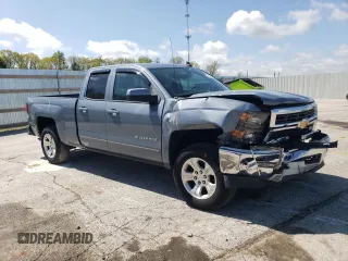 2015 Chevrolet Silverado 1500 LT with VIN 1GCVKREC7FZ435447, listed as a Copart auction lot 54519515 with 124,881 mi miles and Salvage Title. Bid and sale history available at DreamBid. Image 4.