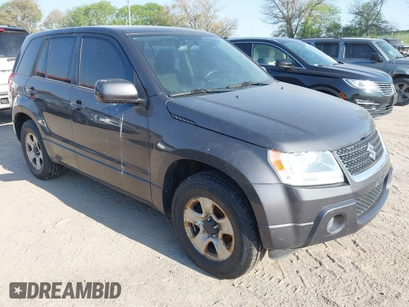 2012 Suzuki Grand Vitara Premium z VIN JS3TD0D22C4101455, wystawiony jako IAAI lot #42211776 z przebiegiem 153 569 mil mil oraz . Historia ofert i sprzedaży dostępna na DreamBid. Obrazek 1.