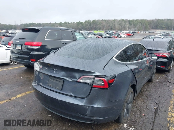 2019 Tesla Model 3 Mid Range with VIN 5YJ3E1EA3KF426971, listed as a IAAI auction lot 41564939 with Not Provided miles and . Bid and sale history available at carsss.com. Image 4.