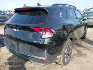 2023 Kia Sportage Plug-In Hybrid X-Line with VIN KNDPYDAH9P7027170, listed as a IAAI auction lot 41583963 with 15,276 mi miles. Bid and sale history available at carsss.com. Image 4.