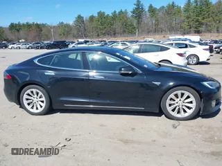 2016 Tesla Model S 90D with VIN 5YJSA1E21GF140740, listed as a IAAI auction lot 42062461 with 237,943 mi miles and . Bid and sale history available at DreamBid. Image 12.