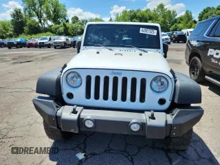 2015 Jeep Wrangler Unlimited Freedom with VIN 1C4HJWDGXFL755528, listed as a Copart auction lot 64927525 with 111,096 mi miles and Salvage title. Bid and sale history available at DreamBid. Image 5.