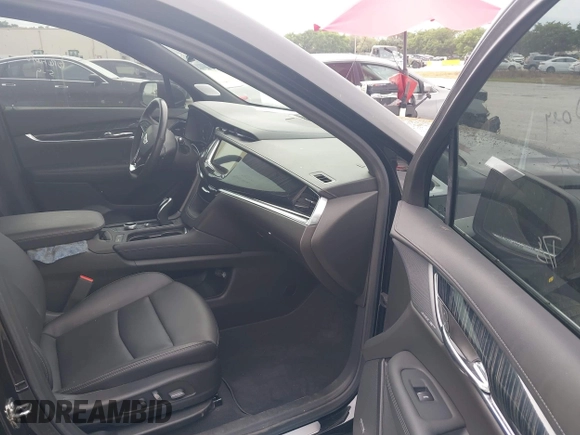2023 Cadillac XT6 FWD Premium Luxury with VIN 1GYKPCRS6PZ106284, listed as a IAAI auction lot 41595617 with 32,795 mi miles and . Bid and sale history available at DreamBid. Image 5.