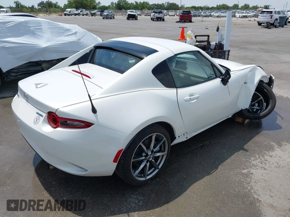 2023 Mazda MX-5 Miata Grand Touring с VIN JM1NDAM71P0560062, выставлен на аукционе IAAI как лот 42065123 с пробегом 11 320 миль миль и . История ставок и продаж доступна на DreamBid. Изображение 4.