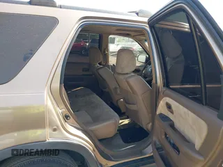 2003 Honda CR-V EX with VIN SHSRD78853U147671, listed as a IAAI auction lot 42117265 with 228,072 mi miles and . Bid and sale history available at carsss.com. Image 8.