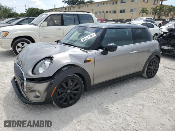 2018 MINI Hardtop Cooper with VIN WMWXP5C56J2H29012, listed as a Copart auction lot 50571595 with 77,129 mi miles and Salvage title. Bid and sale history available at DreamBid. Image 1.