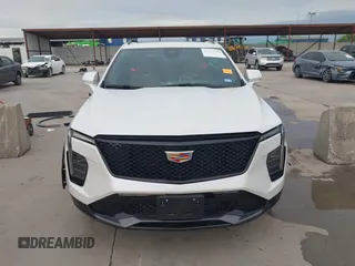 2024 Cadillac XT4 FWD Sport with VIN 1GYFZER42RF246488, listed as a IAAI auction lot 42029551 with 6,476 mi miles and . Bid and sale history available at DreamBid. Image 13.