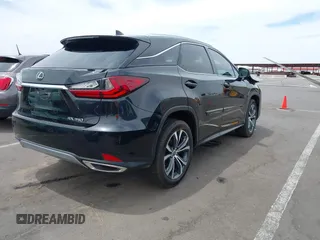 2021 Lexus RX 350 with VIN 2T2HZMDA5MC263109, listed as a IAAI auction lot 42249633 with 53,375 mi miles and . Bid and sale history available at DreamBid. Image 4.