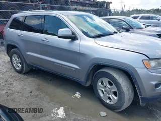 2016 Jeep Grand Cherokee 75th Anniversary with VIN 1C4RJEAG4GC391059, listed as a IAAI auction lot 42485892 with 160,000 mi miles and . Bid and sale history available at DreamBid. Image 1.