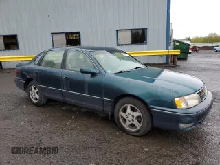 1998 Toyota Avalon XL with VIN 4T1BF18B6WU242906, listed as a Copart auction lot 52385935 with 108,802 mi miles and Salvage Title. Bid and sale history available at DreamBid. Image 4.