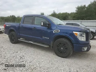2017 Nissan Titan Pro-4X with VIN 1N6AA1E53HN570548, listed as a Copart auction lot 71663224 with 128,024 mi miles and Salvage title. Bid and sale history available at DreamBid. Image 4.
