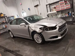 2014 Ford Fusion SE Hybrid с VIN 3FA6P0LU1ER227571, выставлен на аукционе IAAI как лот 42391487 с пробегом 127 979 миль миль и . История ставок и продаж доступна на DreamBid. Изображение 13.