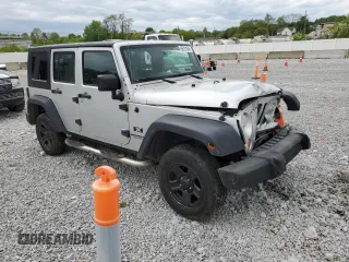 2007 Jeep Wrangler Unlimited X with VIN 1J4GA39117L169245, listed as a Copart auction lot 56731665 with 136,247 mi miles and Salvage title. Bid and sale history available at DreamBid. Image 4.