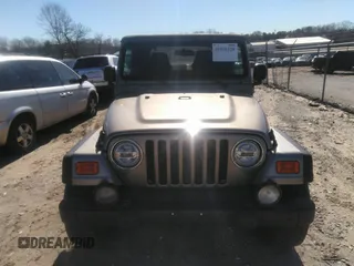 2003 Jeep Wrangler Sport with VIN 1J4FA49S53P365363, listed as a IAAI auction lot 41818320 with 154,567 mi miles. Bid and sale history available at carsss.com. Image 12.