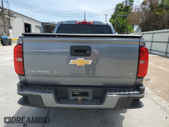 2018 Chevrolet Colorado 2WD LT with VIN 1GCGSCEN6J1143433, listed as a Copart auction lot 56942765 with 115,450 mi miles and Salvage title. Bid and sale history available at DreamBid. Image 6.