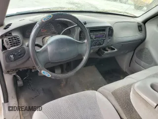 1999 Ford F-150 с VIN 1FTRF17W2XNA78962, выставлен на аукционе Copart как лот 51786985 с пробегом Не указан миль и Чистый • Clean title. История ставок и продаж доступна на DreamBid. Изображение 8.