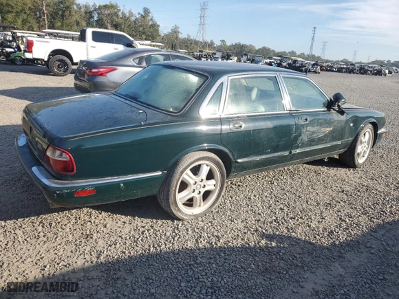 2003 Jaguar XJ with VIN SAJDA12C63LF56705, listed as a Copart auction lot 81903784 with 0 mi miles and Salvage Title. Bid and sale history available at carsss.com. Image 3.