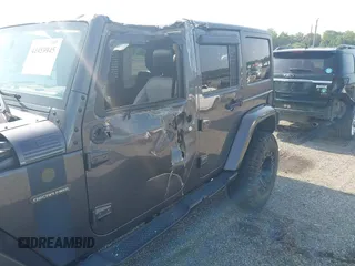 2016 Jeep Wrangler Unlimited Sport with VIN 1C4BJWDG9GL211030, listed as a IAAI auction lot 42459945 with 61,671 mi miles and . Bid and sale history available at DreamBid. Image 6.