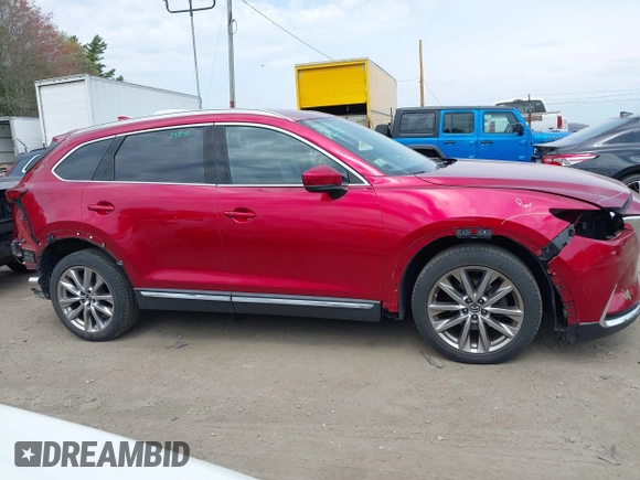 2019 Mazda CX-9 Grand Touring with VIN JM3TCBDY8K0333394, listed as a IAAI auction lot 42109778 with 58,887 mi miles and . Bid and sale history available at DreamBid. Image 14.