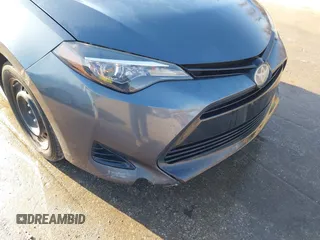 2018 Toyota Corolla L z VIN 2T1BURHE5JC969463, wystawiony jako IAAI lot #41760784 z przebiegiem 406 432 mil mil oraz . Historia ofert i sprzedaży dostępna na DreamBid. Obrazek 19.