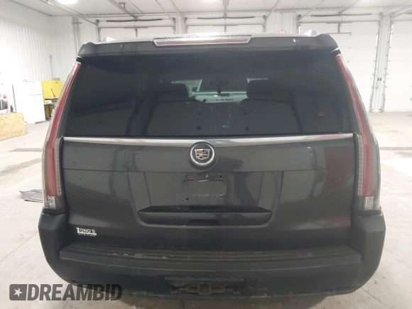 2015 Cadillac Escalade Premium with VIN 1GYS4CKJ8FR308617, listed as a IAAI auction lot 41974608 with 154,014 mi miles and . Bid and sale history available at DreamBid. Image 16.