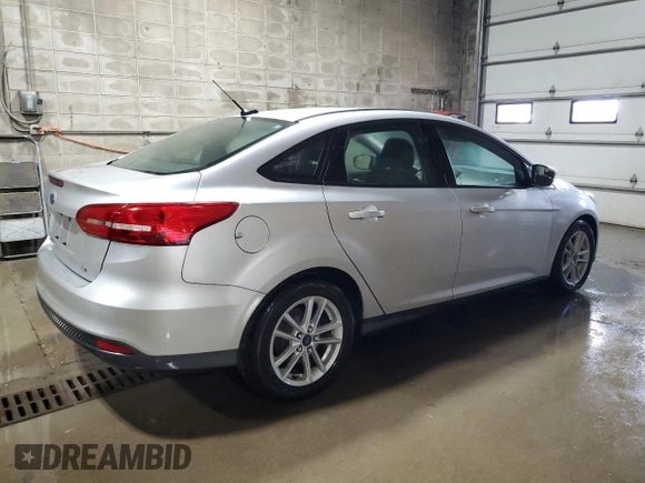 2017 Ford Focus SE with VIN 1FADP3F29HL223970, listed as a Copart auction lot 66022345 with 104,601 mi miles and Clean title. Bid and sale history available at DreamBid. Image 3.