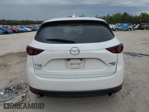 2021 Mazda CX-5 Grand Touring Reserve with VIN JM3KFBAY5M0320404, listed as a Copart auction lot 50405075 with 32,596 mi miles and Salvage Title. Bid and sale history available at carsss.com. Image 6.