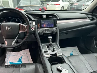 2017 Honda Civic EX-L с VIN 19XFC1F76HE013074, выставлен на аукционе Copart как лот 60144655 с пробегом 121 493 миль миль и Чистый • Clean title. История ставок и продаж доступна на DreamBid. Изображение 9.