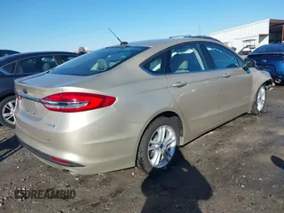 2018 Ford Fusion S z VIN 3FA6P0UU8JR271589, wystawiony jako IAAI lot #41318471 z przebiegiem 148 793 mil mil oraz . Historia ofert i sprzedaży dostępna na DreamBid. Obrazek 4.