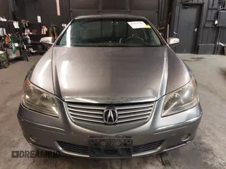 2006 Acura RL z VIN JH4KB165X6C009547, wystawiony jako IAAI lot #42073784 z przebiegiem 190 601 mil mil oraz . Historia ofert i sprzedaży dostępna na DreamBid. Obrazek 13.
