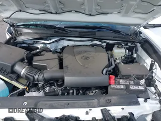2023 Toyota Tacoma SR z VIN 3TMCZ5AN0PM541700, wystawiony jako IAAI lot #41819408 z przebiegiem 14 216 mil mil oraz . Historia ofert i sprzedaży dostępna na DreamBid. Obrazek 10.
