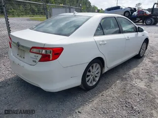2012 Toyota Camry Hybrid XLE with VIN 4T1BD1FKXCU030157, listed as a IAAI auction lot 42040131 with 237,412 mi miles. Bid and sale history available at carsss.com. Image 4.