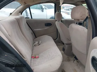 1999 Saturn SL with VIN 1G8ZK5272XZ263163, listed as a IAAI auction lot 42180002 with 138,463 mi miles. Bid and sale history available at carsss.com. Image 8.