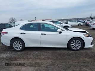 2020 Toyota Camry LE with VIN 4T1C11AK9LU912585, listed as a IAAI auction lot 41711816 with 142,751 mi miles. Bid and sale history available at carsss.com. Image 13.