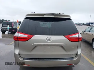2015 Toyota Sienna XLE with VIN 5TDYK3DCXFS578888, listed as a IAAI auction lot 42187384 with 105,287 mi miles and . Bid and sale history available at DreamBid. Image 16.